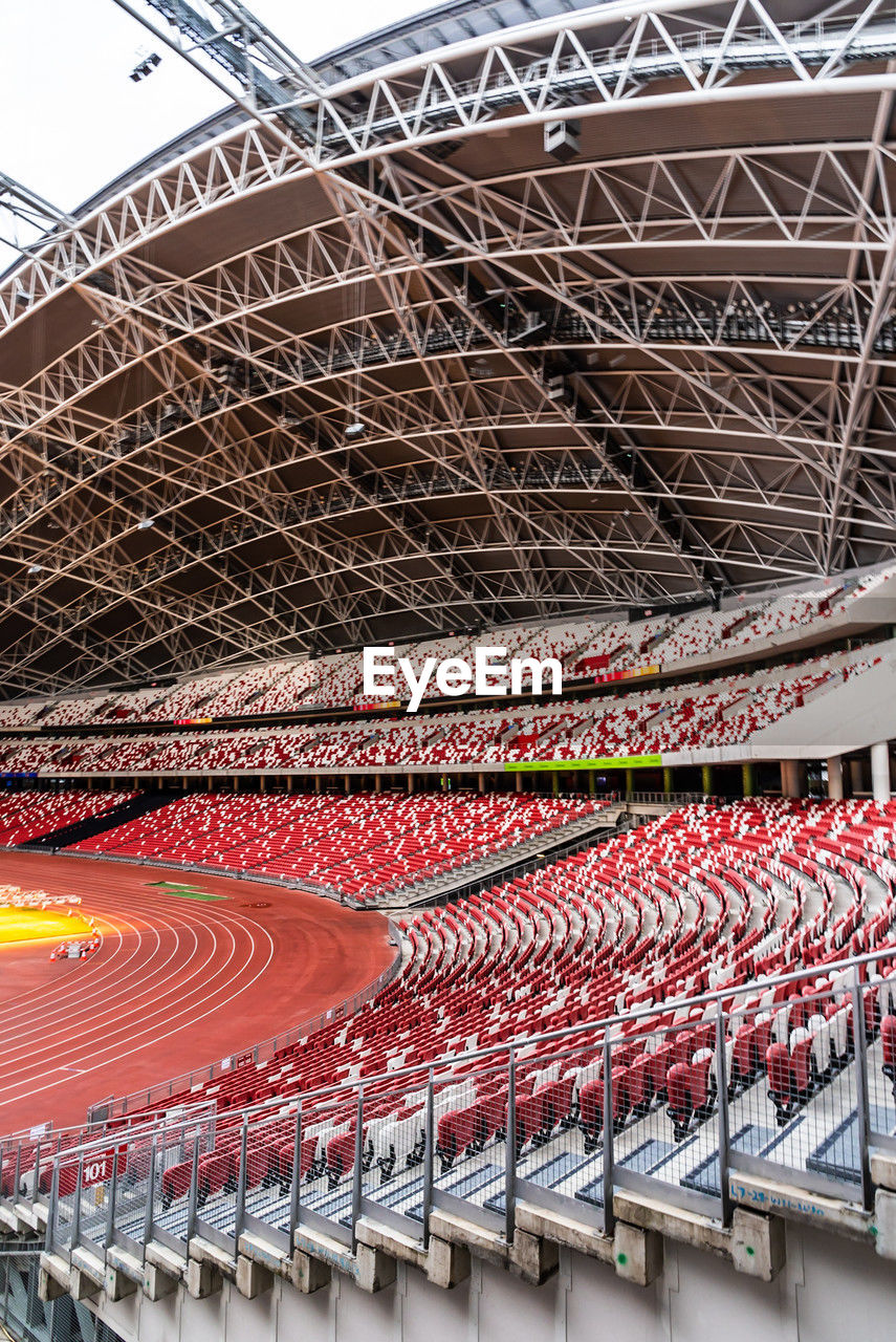 sport venue, stadium, arena, architecture, soccer-specific stadium, built structure, sports, race track, no people, outdoors, red, day, music venue, baseball park
