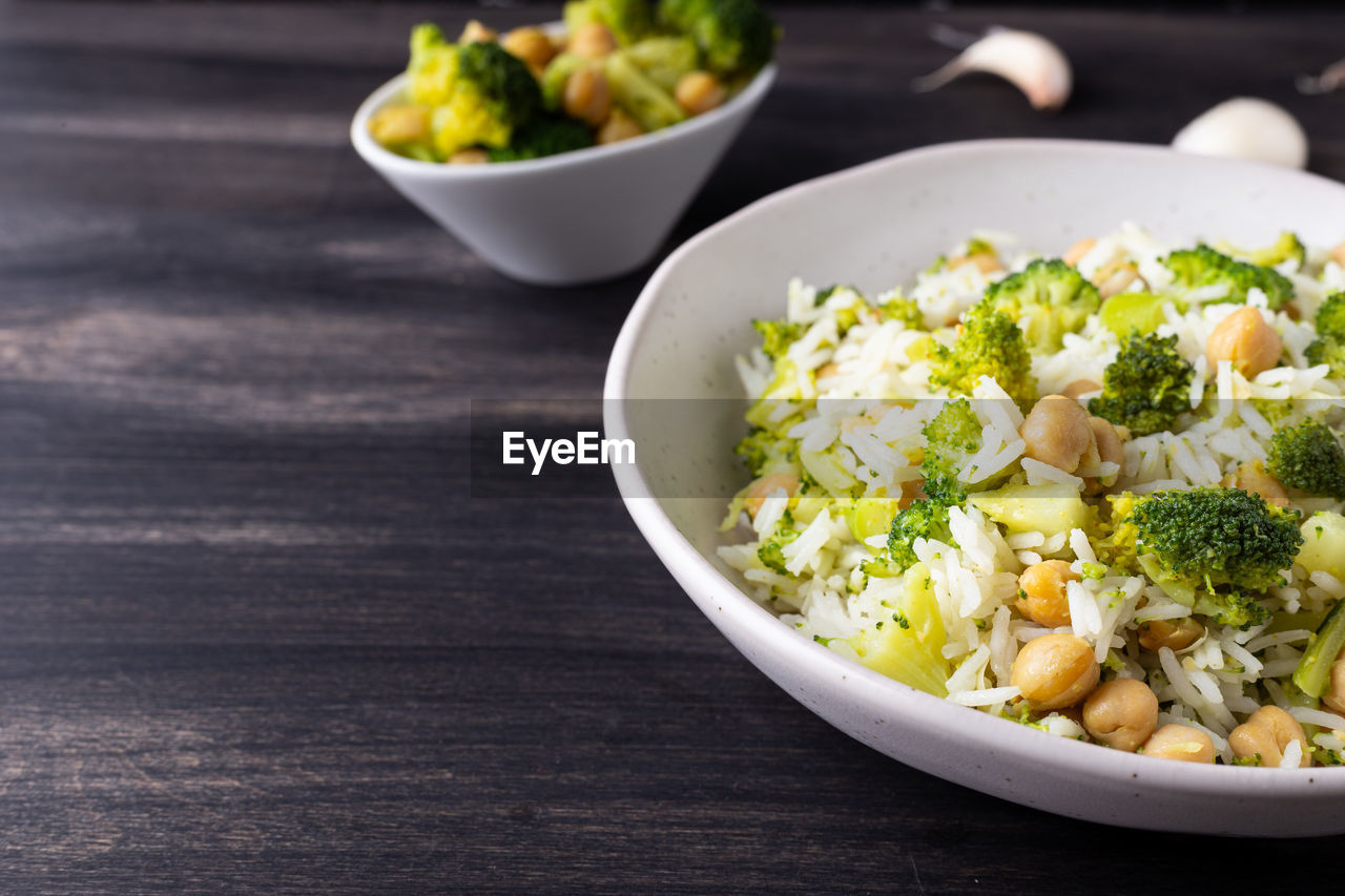 Basmati rice with chickpeas and broccoli. healthy food suitable for those following a vegan diet.
