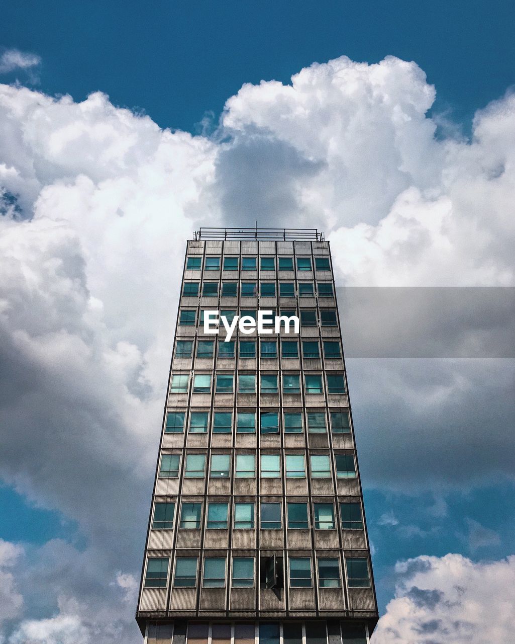 Low angle view of modern building against sky