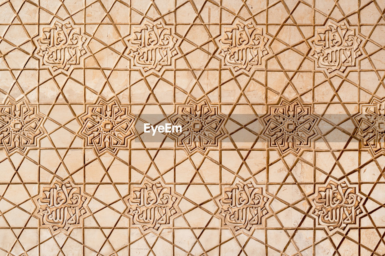 Full frame shot of wall with arabesque style patterns