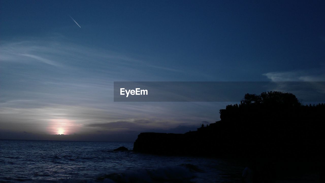 SEA AGAINST SKY DURING SUNSET