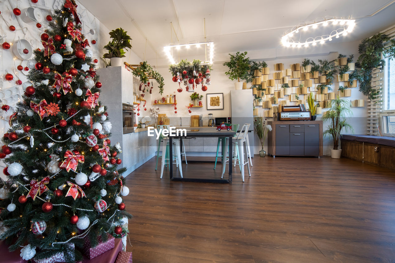 Home kitchen interior decorated for christmas and new year celebration, no people