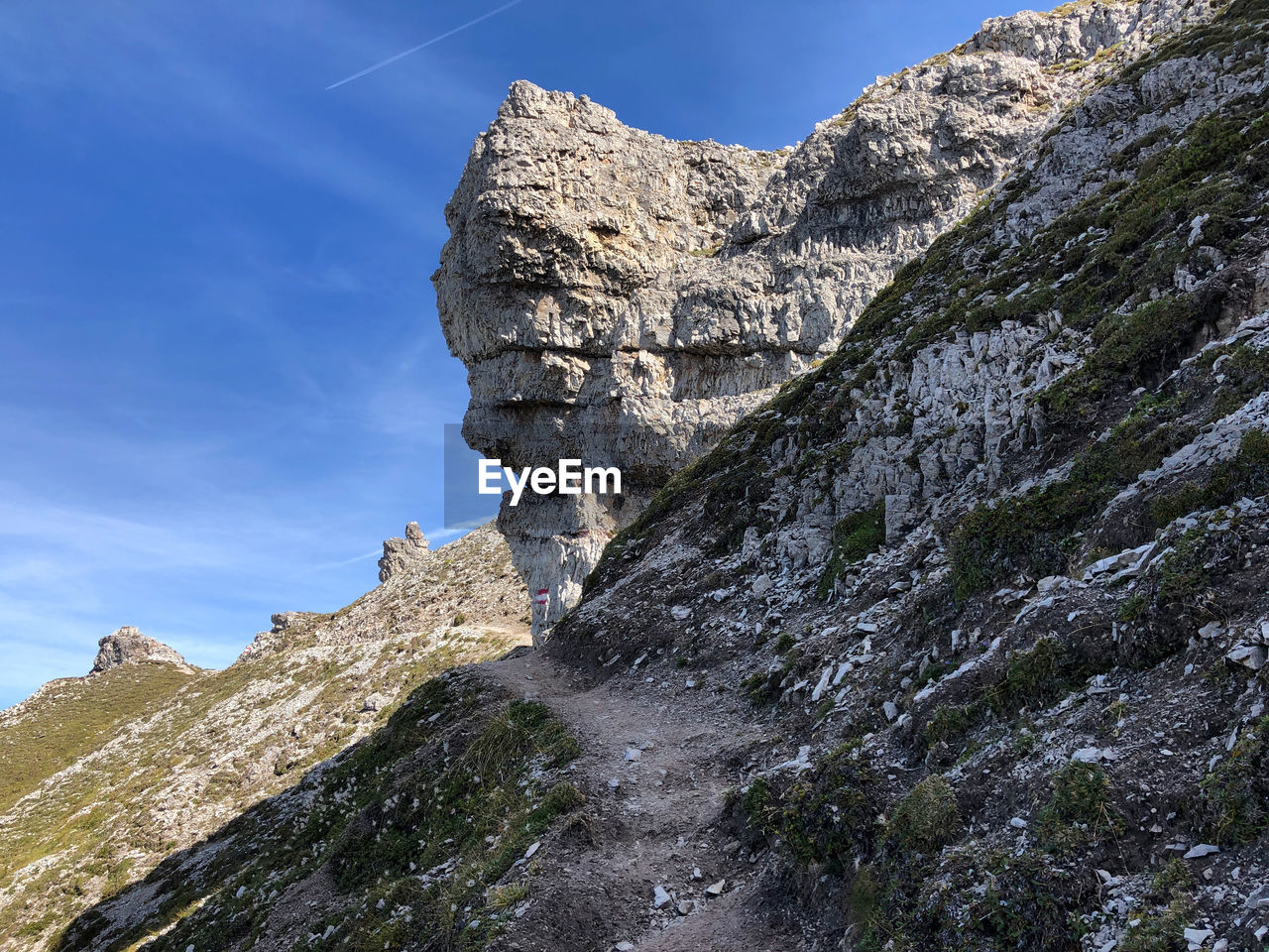 Low angle view of rock formation against sky