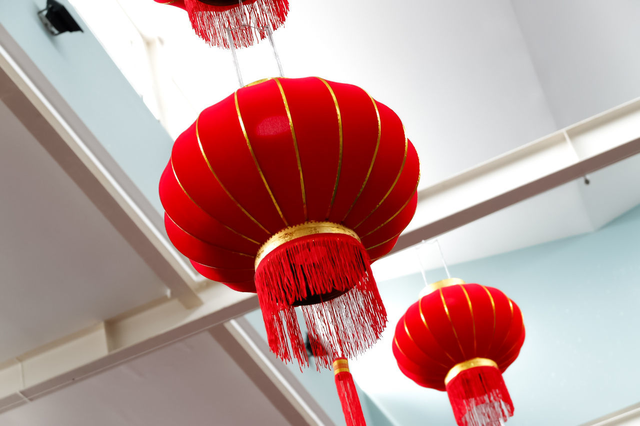 Low angle view of lanterns hanging on ceiling