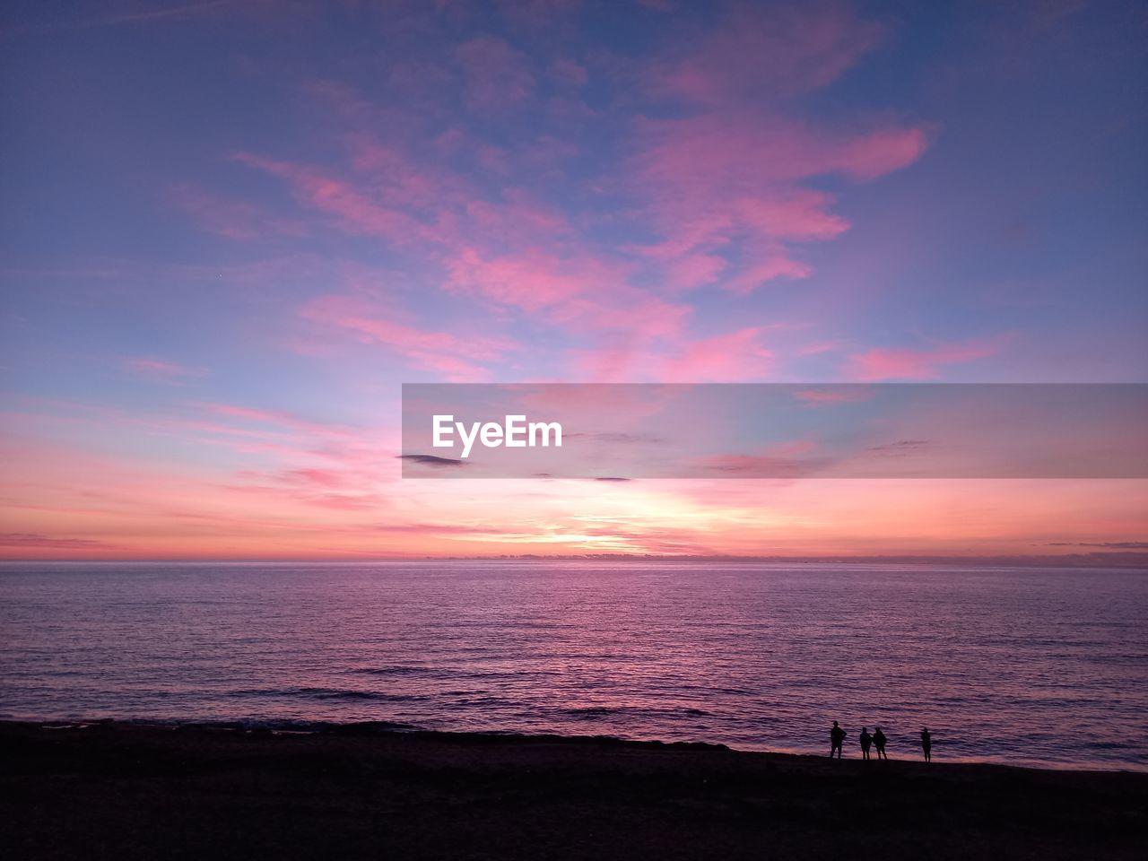 Scenic view of sea against sky during sunset blu and pink