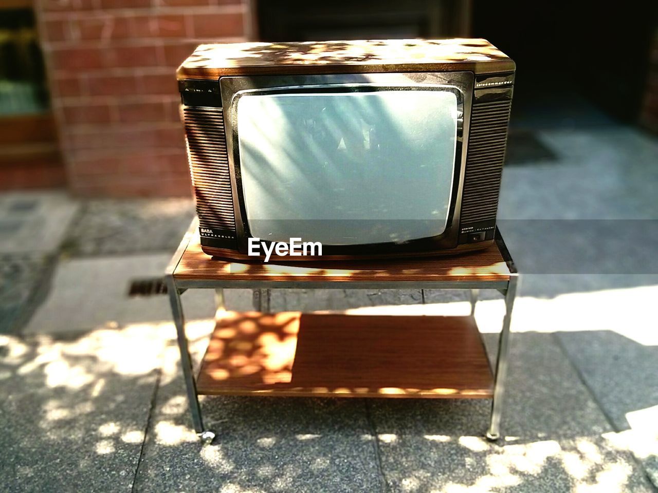 High angle view of old television set on table