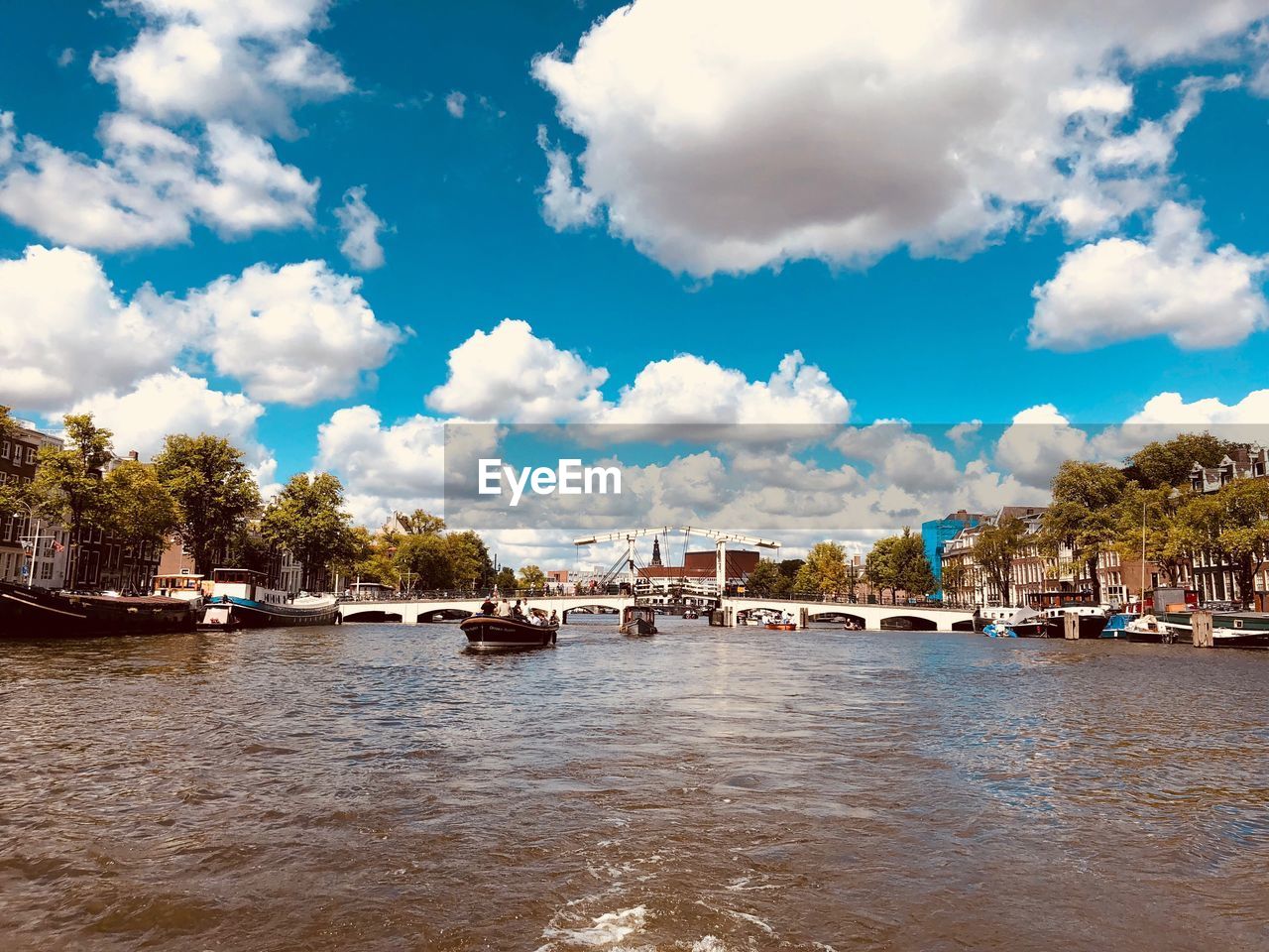 SCENIC VIEW OF RIVER AND TREES AGAINST SKY