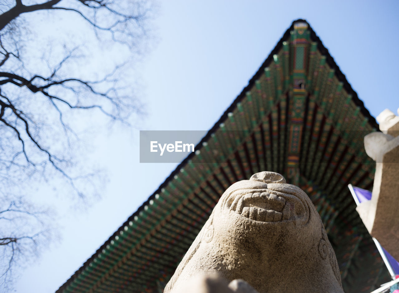 Low angle view of sculpture at jogyesa temple
