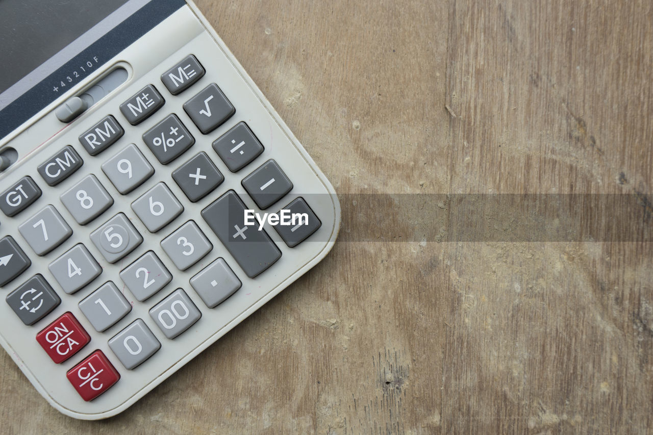 Close-up of calculator on table