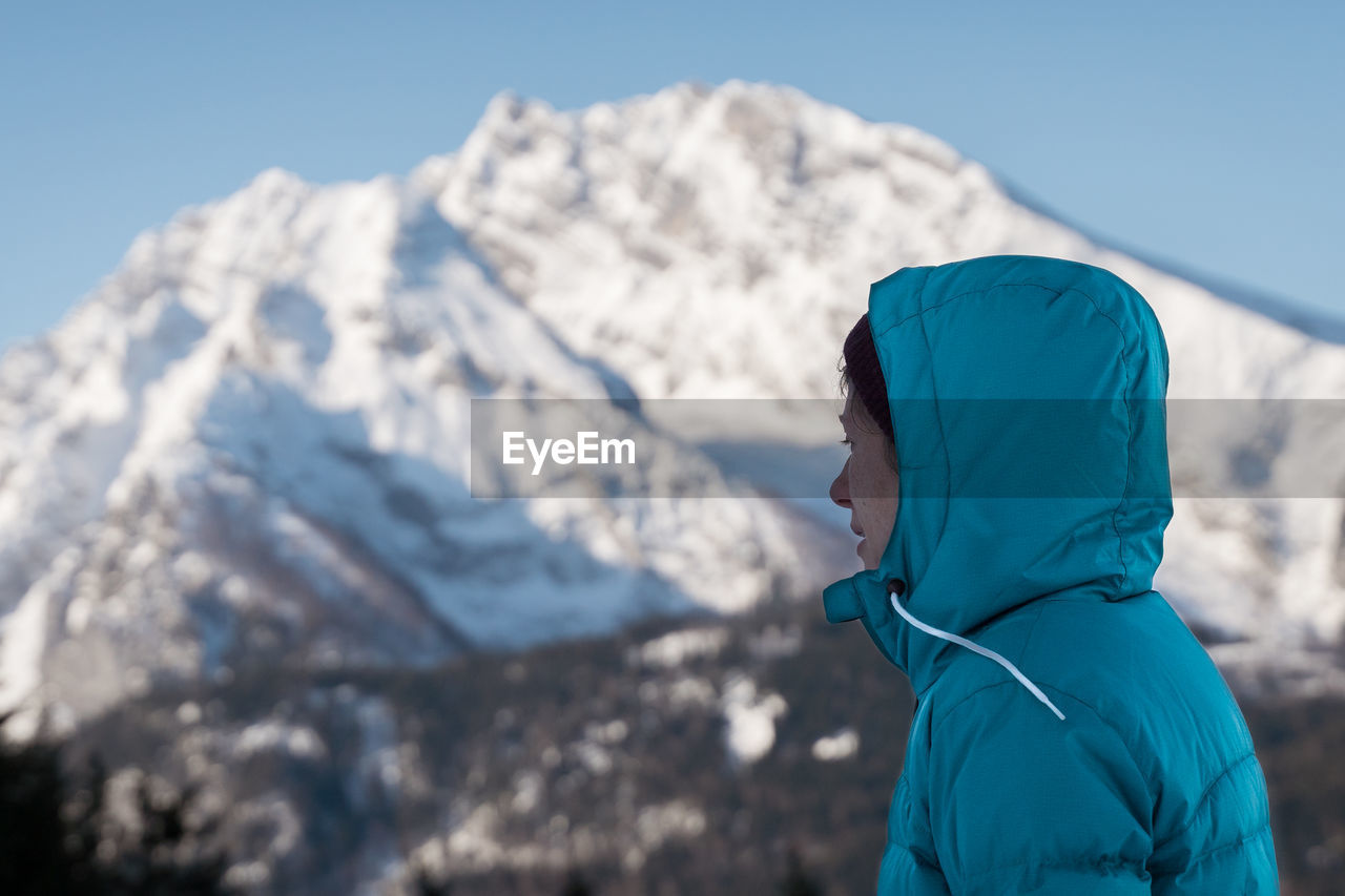 Side view of woman in front of watzmann