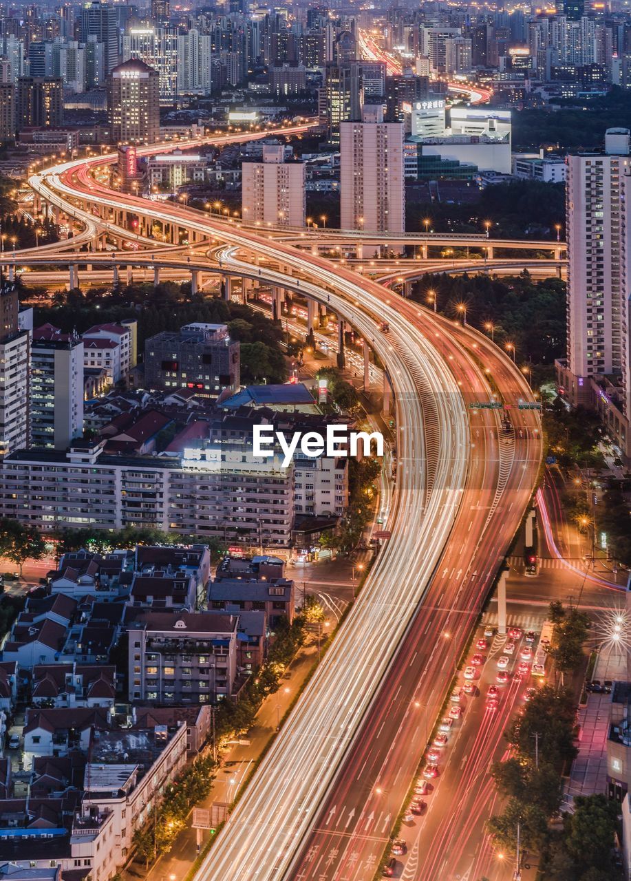 High angle view of illuminated shanghai road at dusk