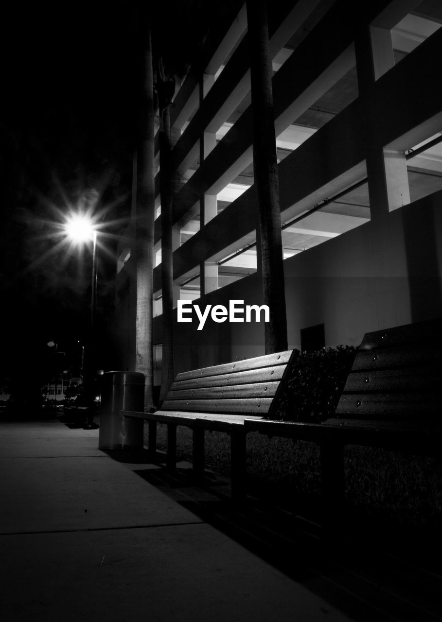 EMPTY ILLUMINATED STREET AT NIGHT