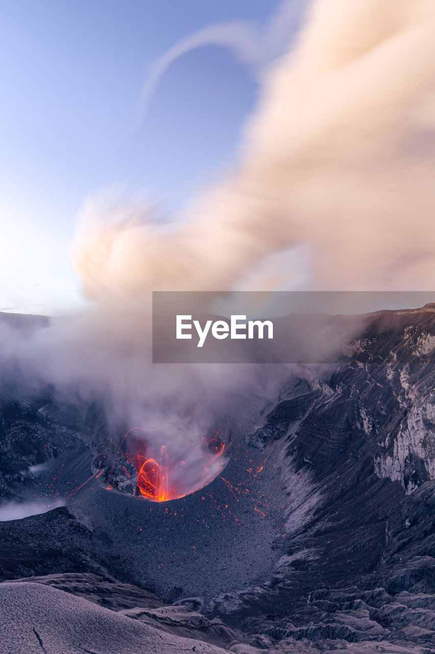 SMOKE EMITTING FROM VOLCANIC LANDSCAPE