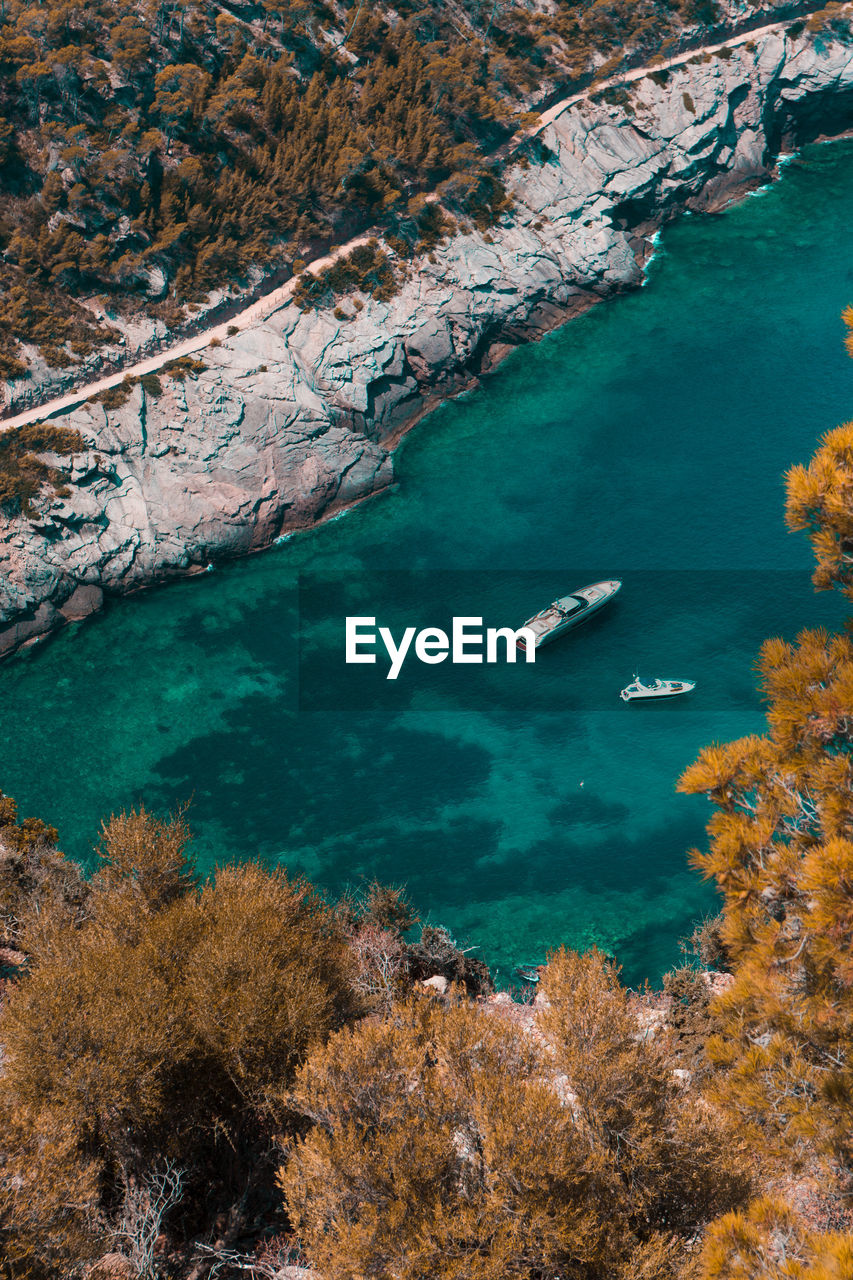 High angle view of sailboats on sea