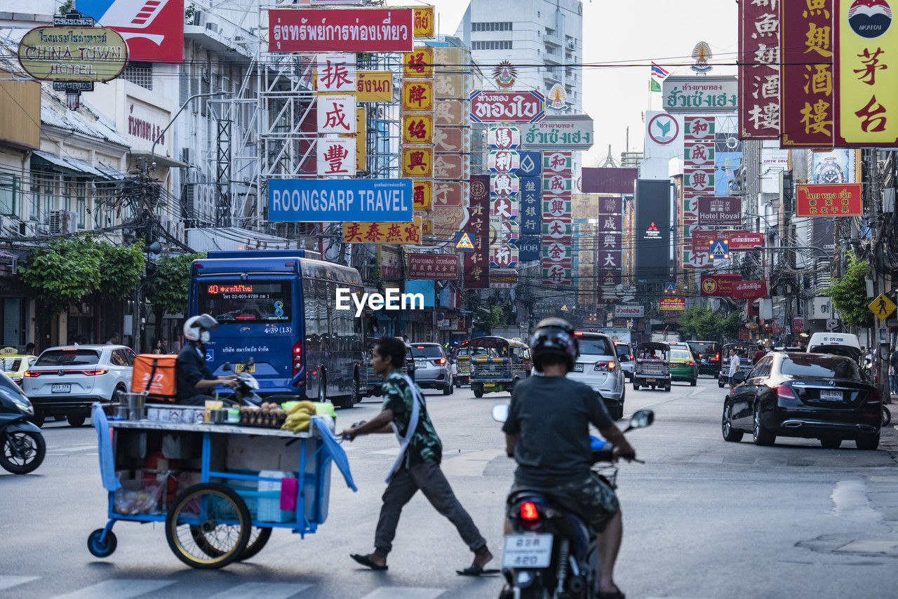 people on street in city