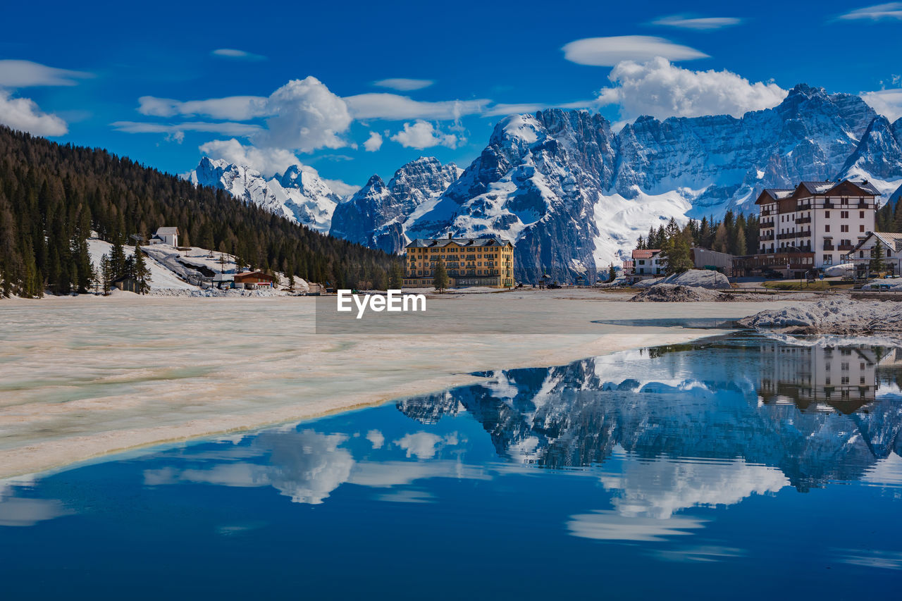 Scenic view of snowcapped mountains against sky during winter