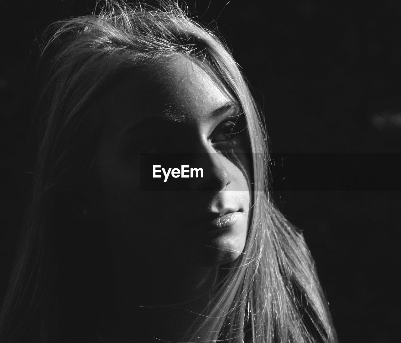CLOSE-UP PORTRAIT OF YOUNG WOMAN WITH EYES