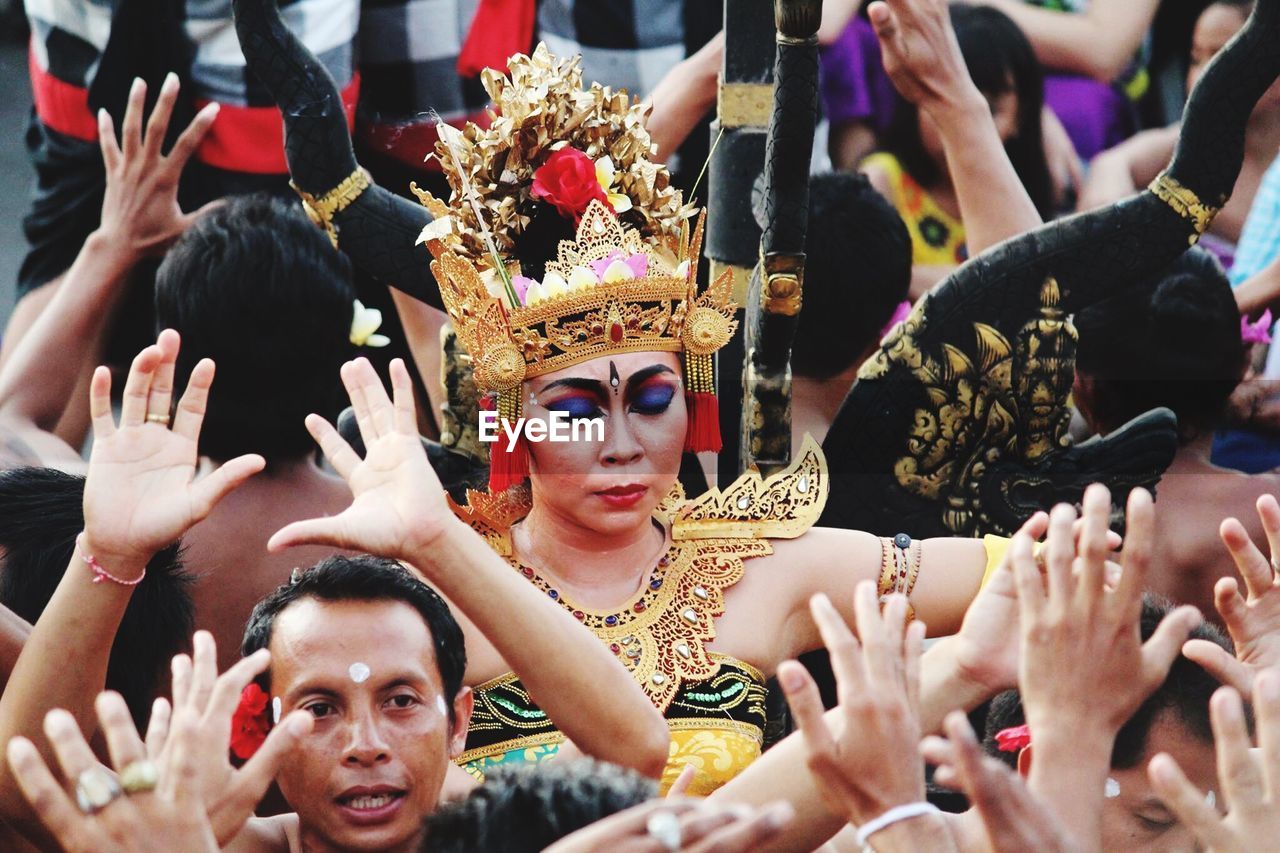 Group of people dancing during traditional festival