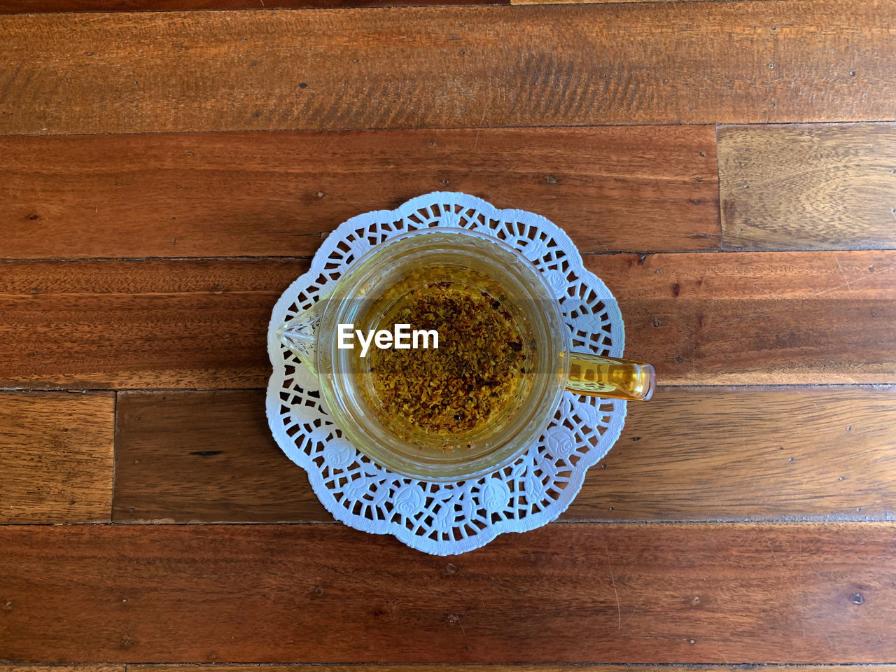 food and drink, wood, table, directly above, cup, mug, drink, coffee, refreshment, crockery, indoors, freshness, coffee cup, food, hot drink, high angle view, still life, no people, saucer, pattern, tea, wellbeing, kitchen utensil, healthy eating