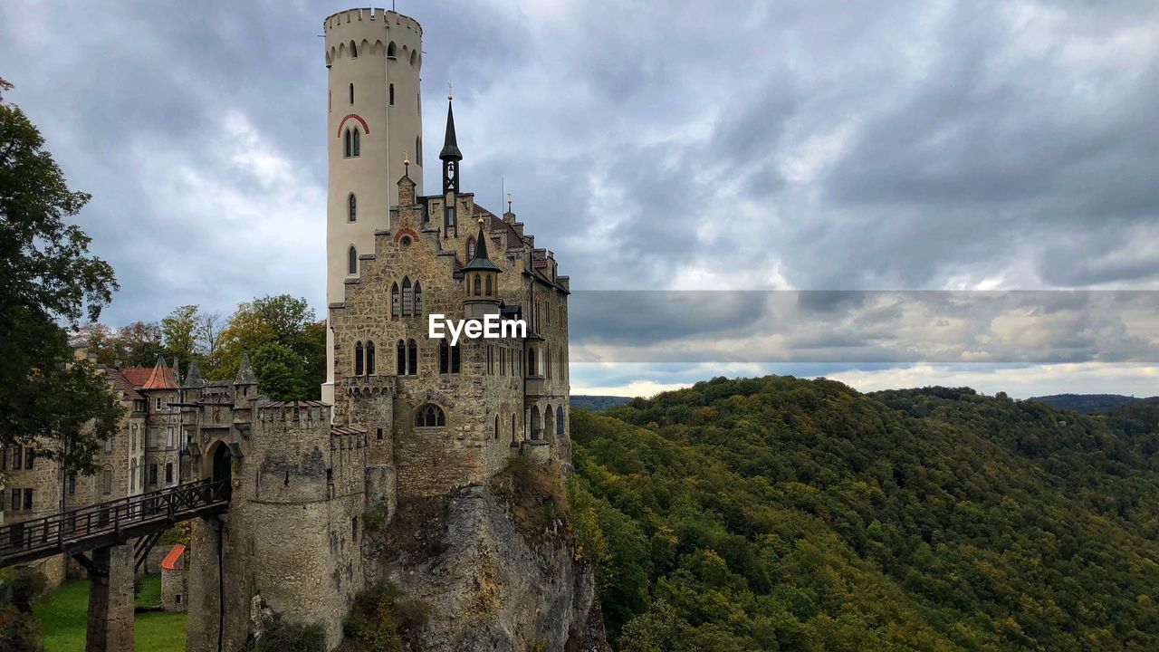 Historic building against cloudy sky