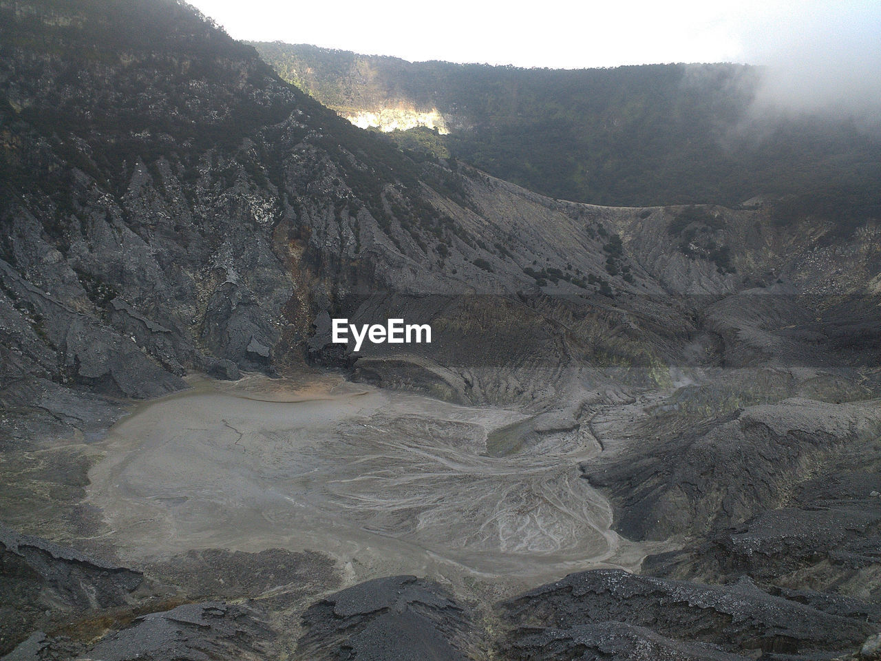 HIGH ANGLE VIEW OF LANDSCAPE AND MOUNTAINS