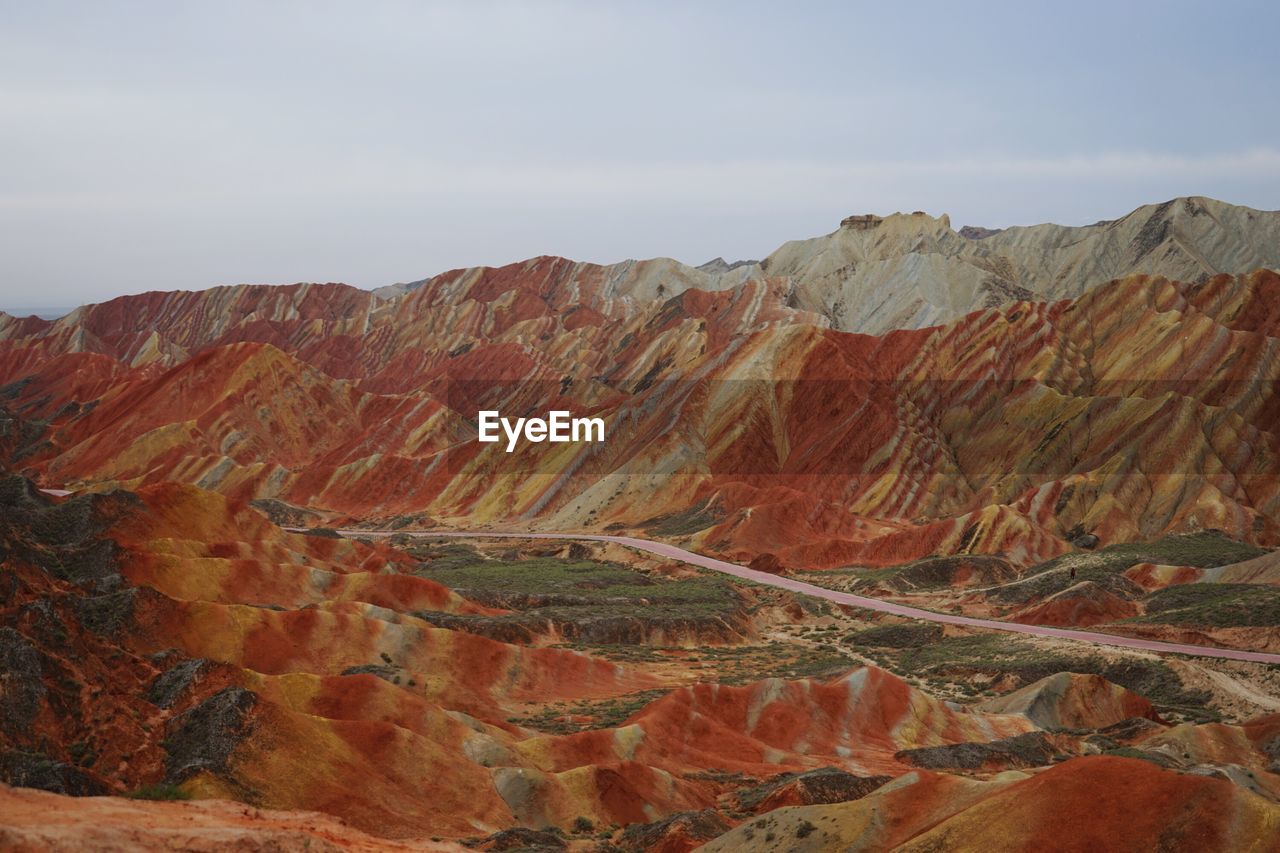 Dramatic landscape against sky at zhangye danxia national geological park