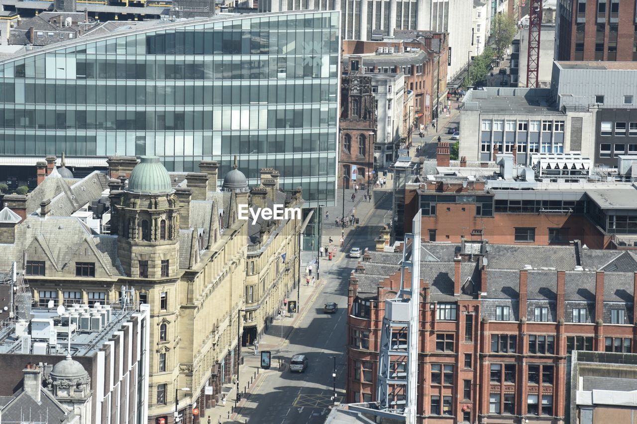 High angle view of street amidst buildings in city