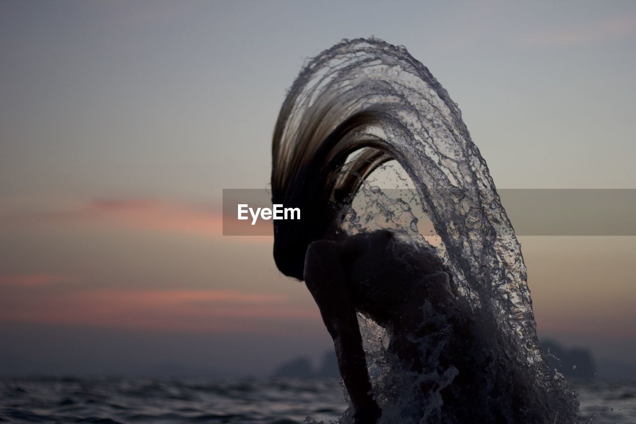 CLOSE-UP OF SEA DURING SUNSET