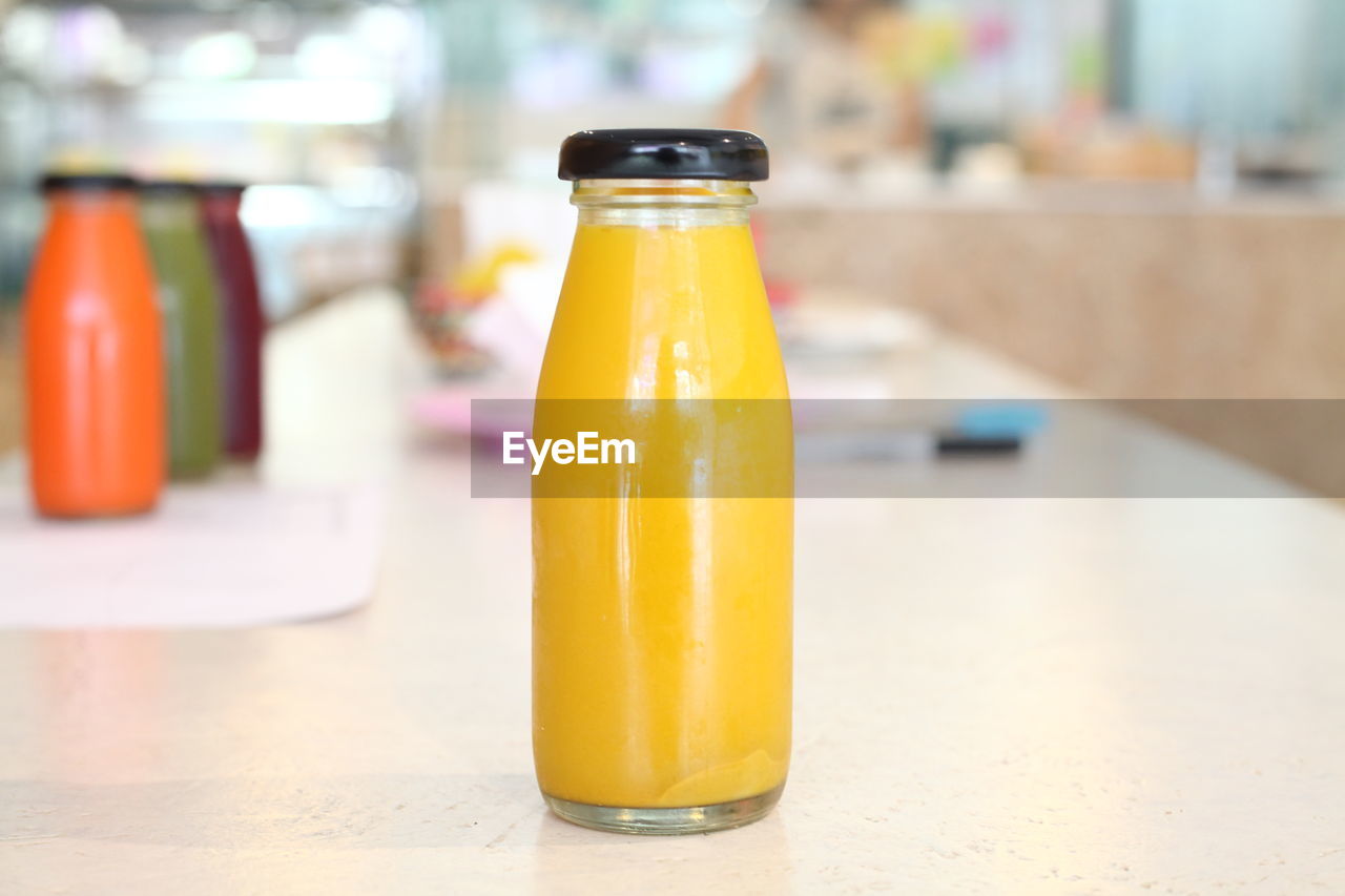 Close-up of drink served on table