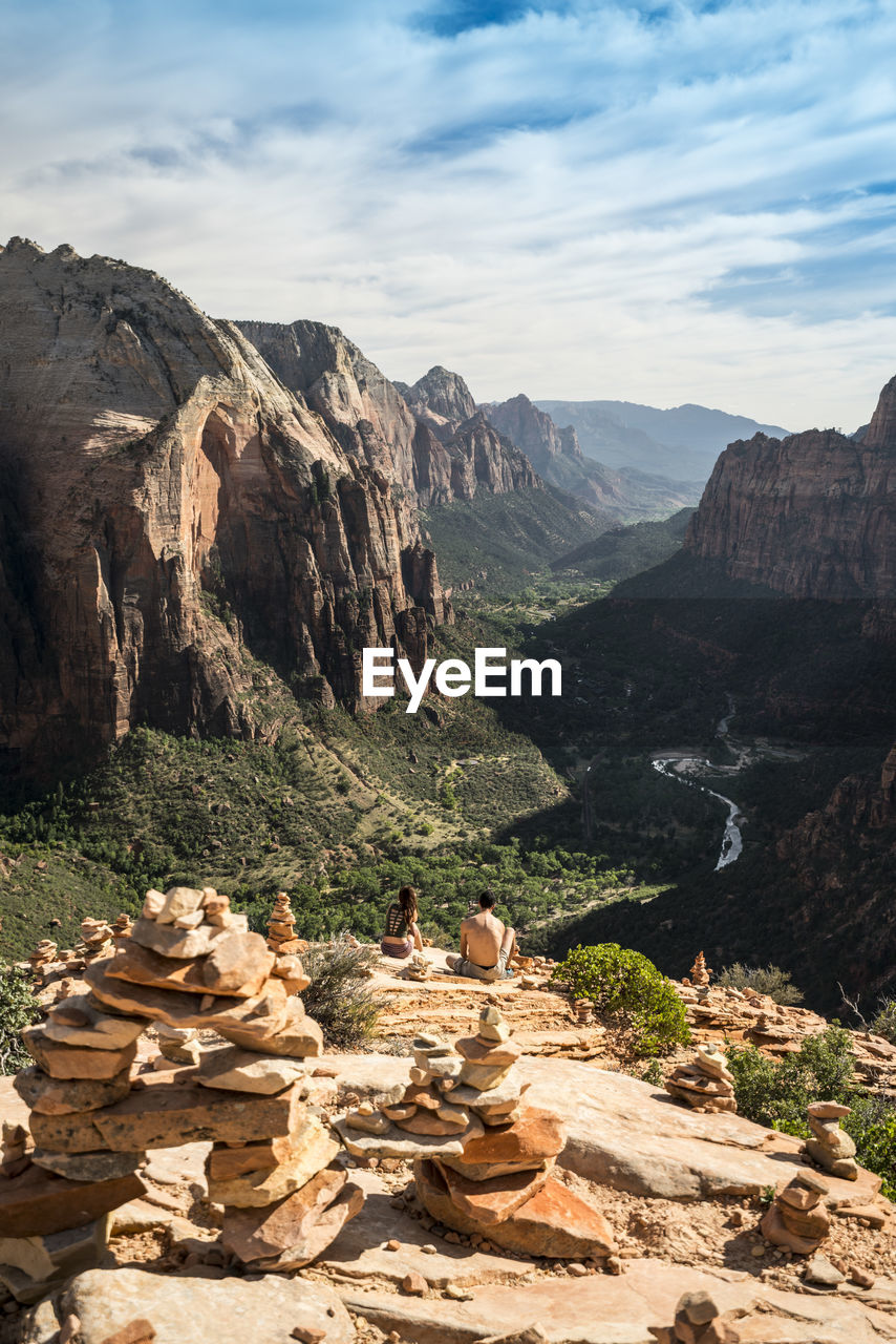 Stack of stones against rocky landscape