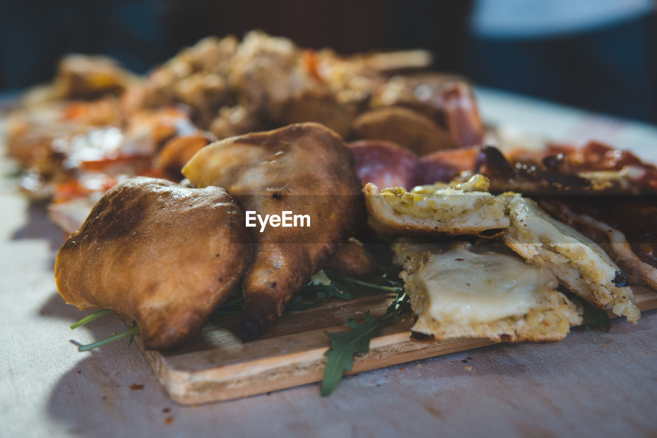 Close-up of meat served on table