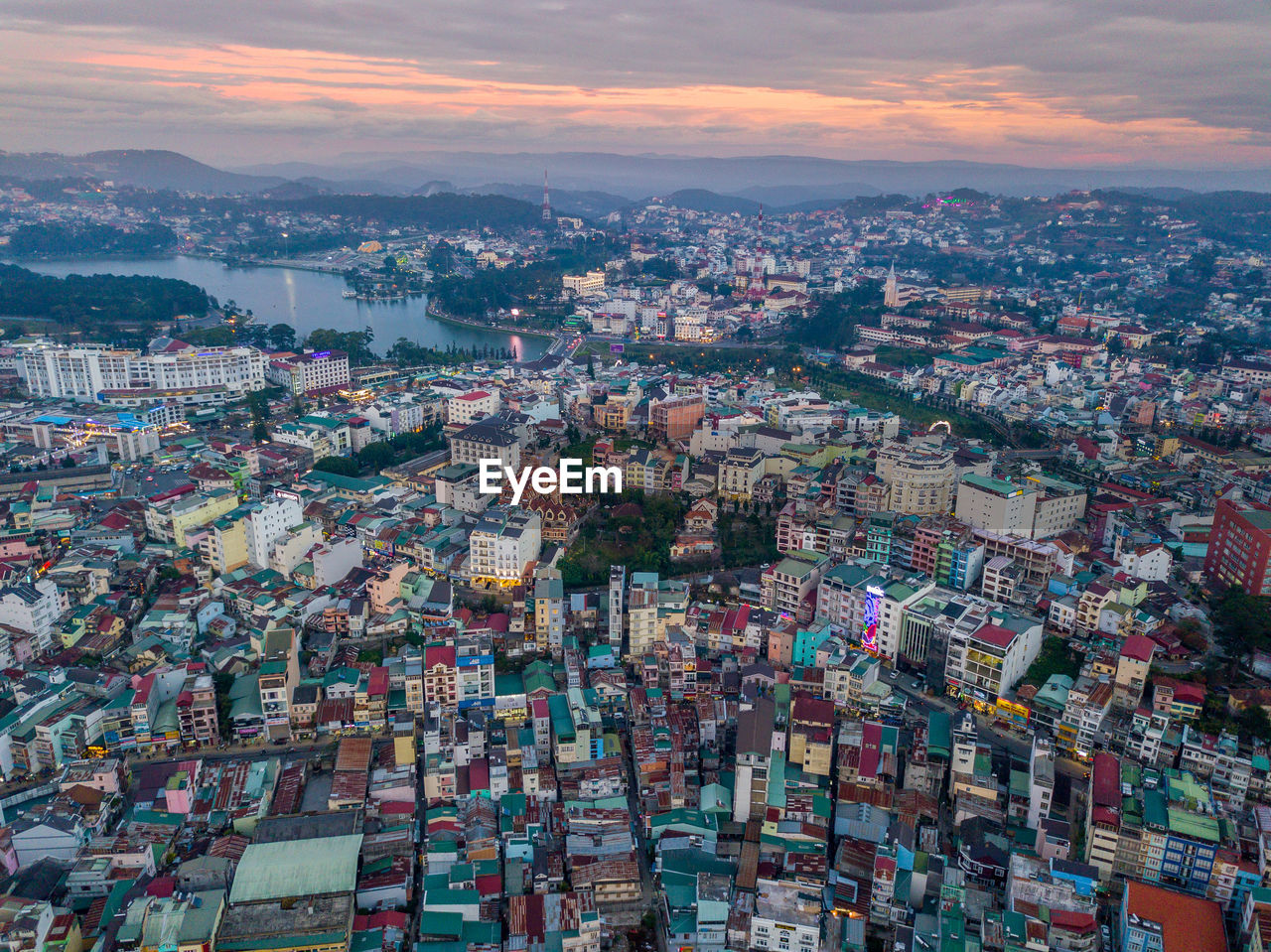 AERIAL VIEW OF CITY AGAINST SKY