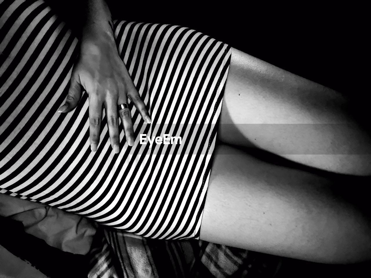 HIGH ANGLE VIEW OF WOMAN TOUCHING HAND