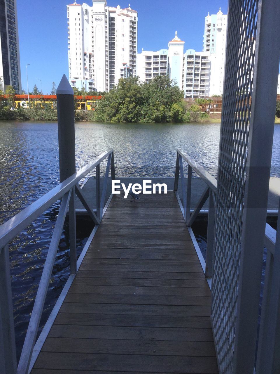 VIEW OF BRIDGE OVER RIVER IN CITY