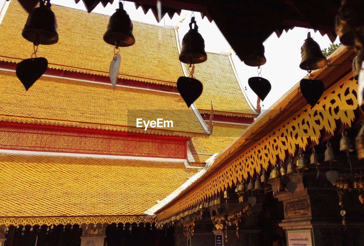 LOW ANGLE VIEW OF ILLUMINATED ROOF