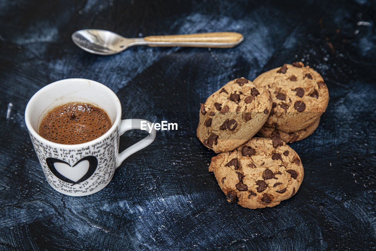 COFFEE AND COOKIES ON TABLE