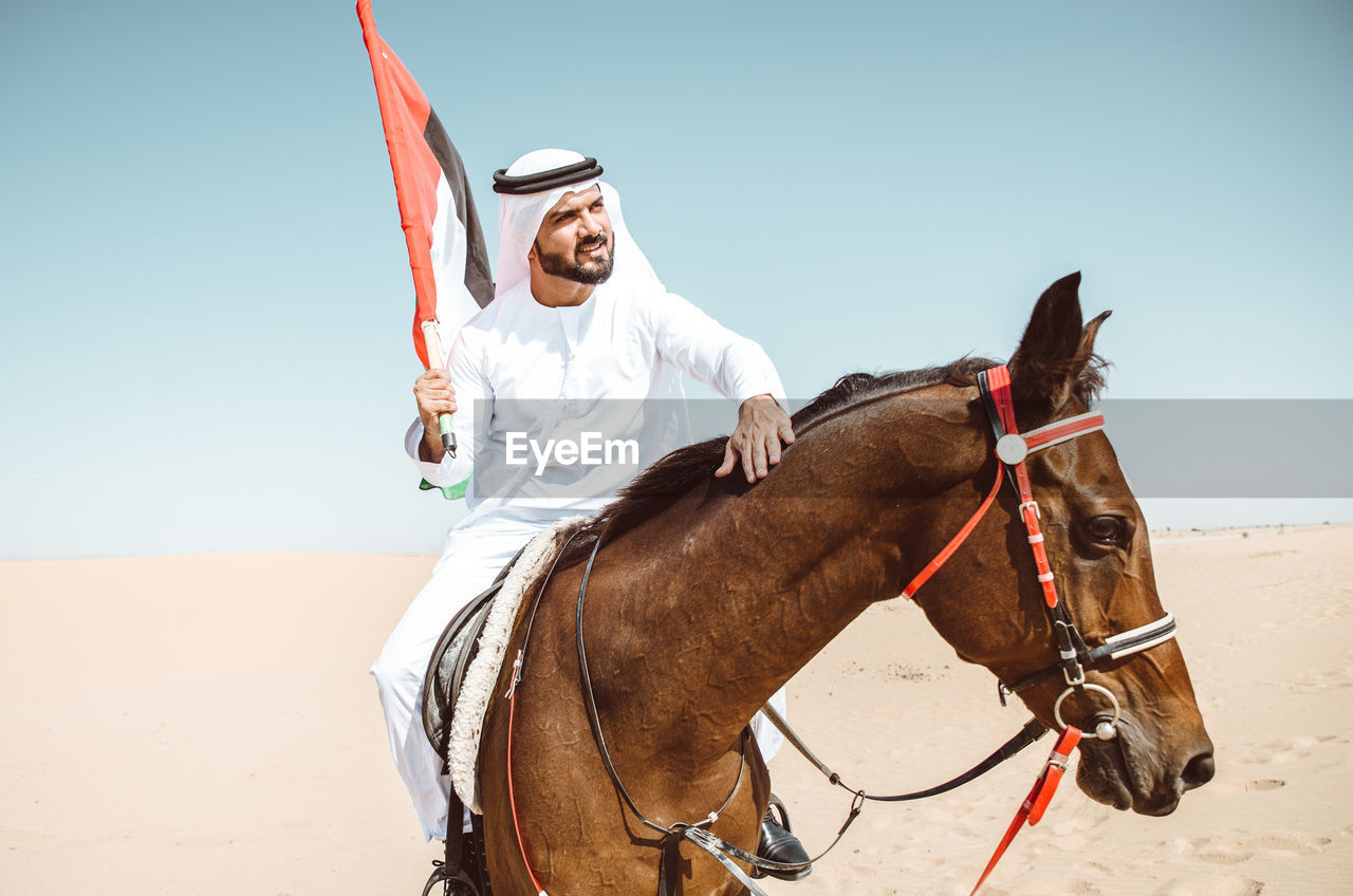 Man riding horse