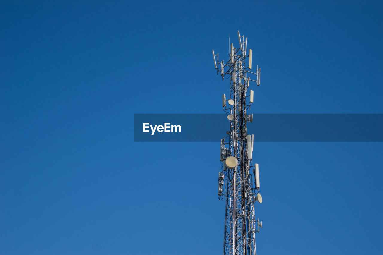 LOW ANGLE VIEW OF COMMUNICATIONS TOWER