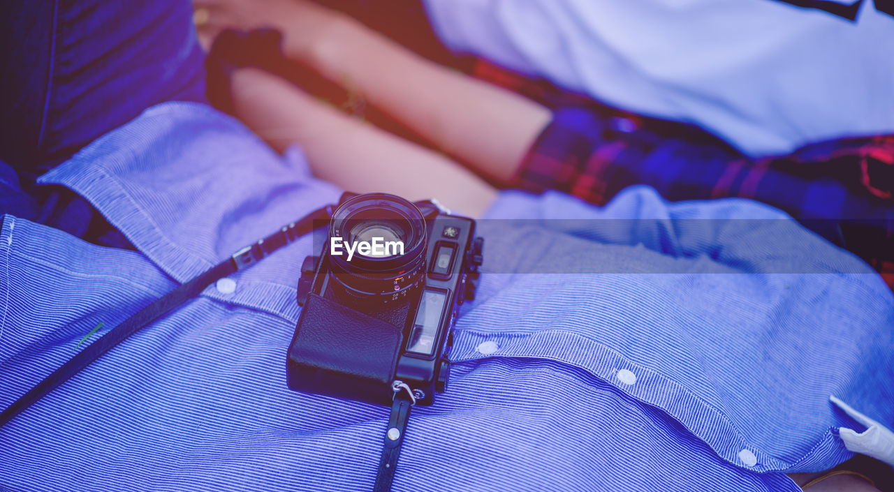 High angle view of couple with camera