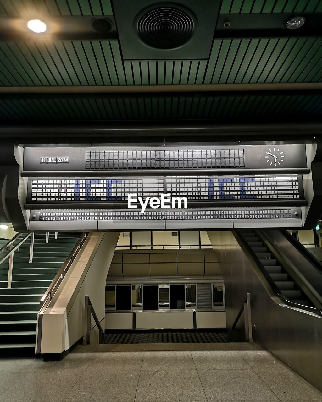 Low angle view of modern building with escalators 