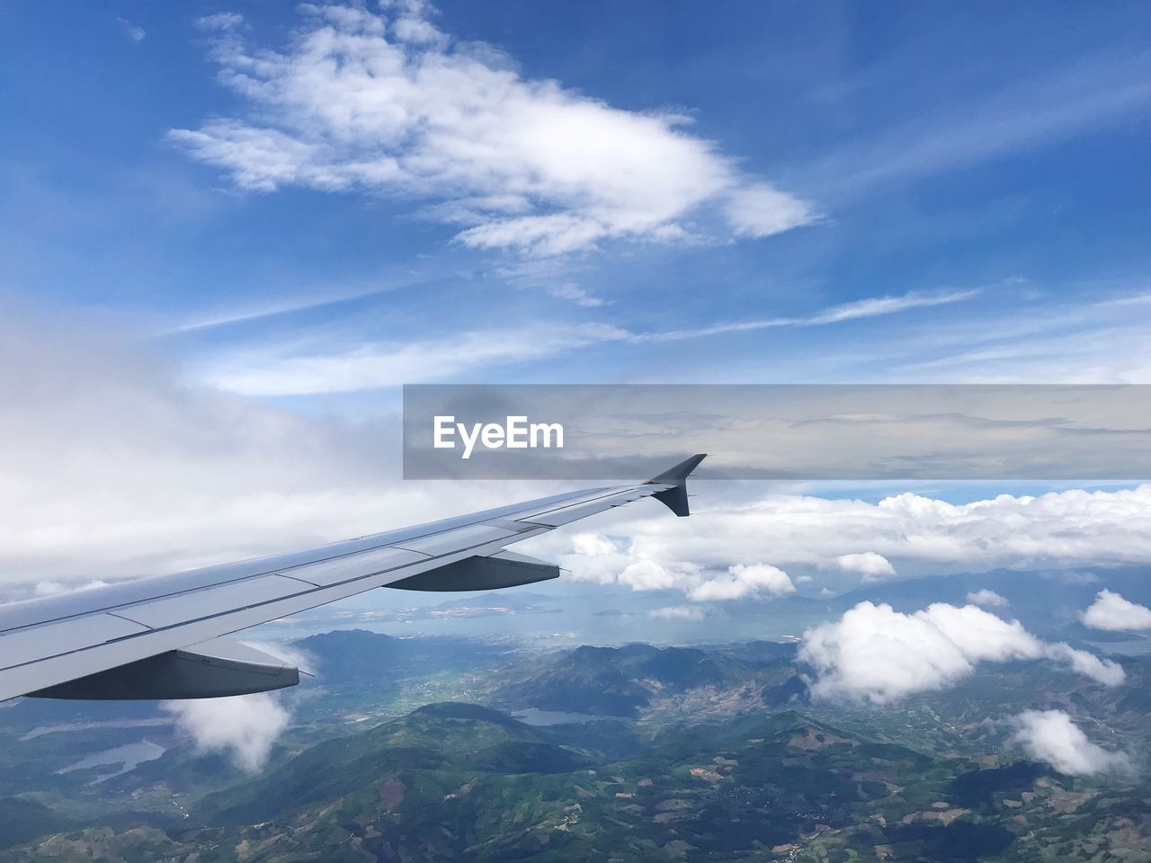 VIEW OF AIRPLANE FLYING IN SKY