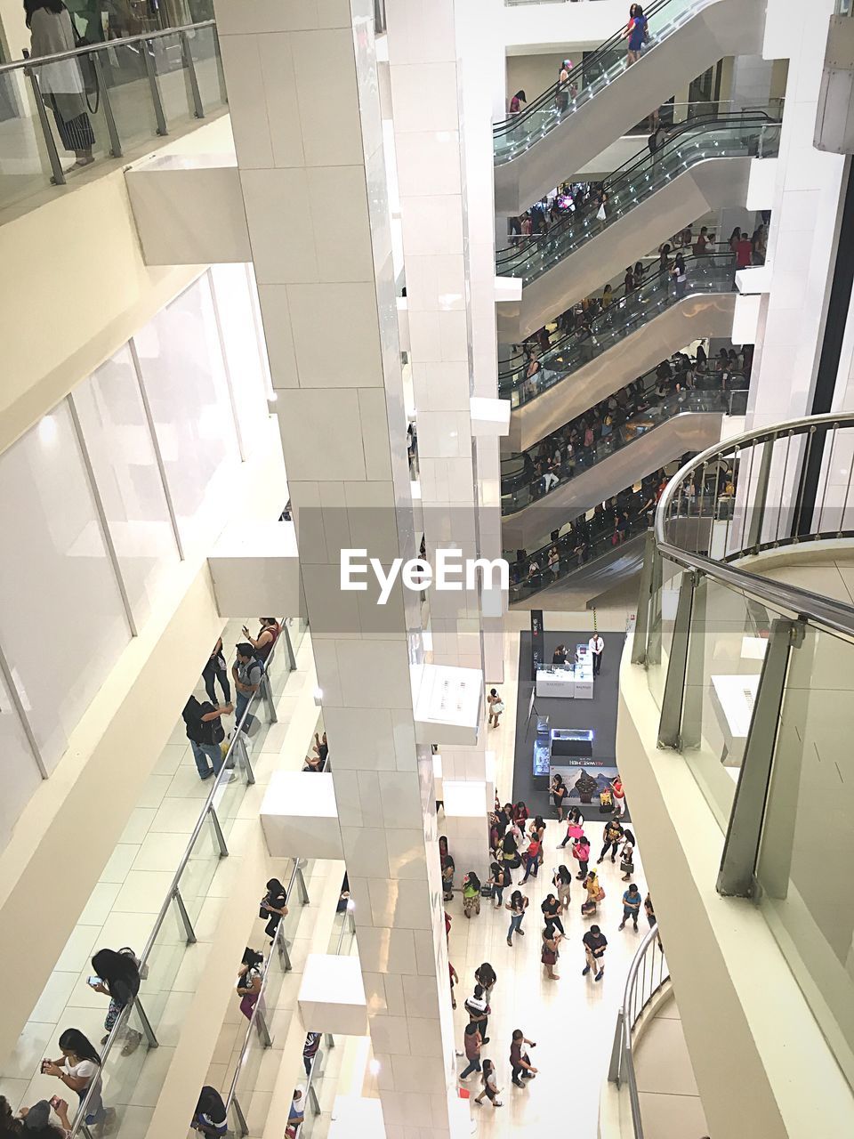 GROUP OF PEOPLE IN SHOPPING MALL