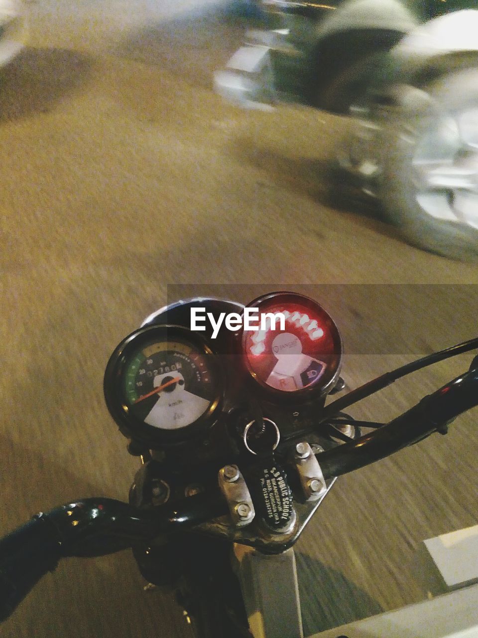 High angle view of motorcycle on road at night