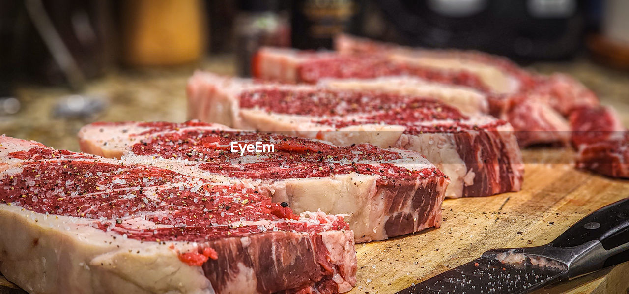 close-up of meat on barbecue grill