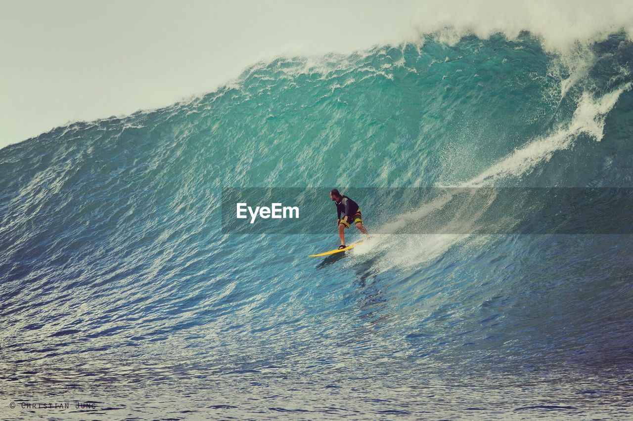 Man surfing in sea