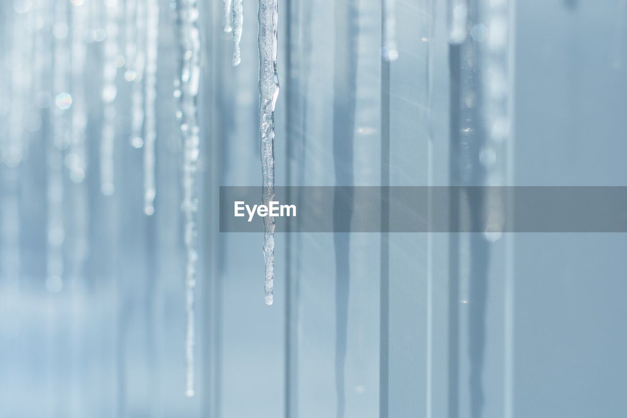 Close-up of ice crystal over white background