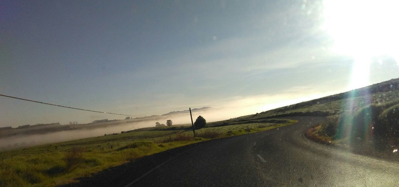 ROAD PASSING THROUGH LANDSCAPE