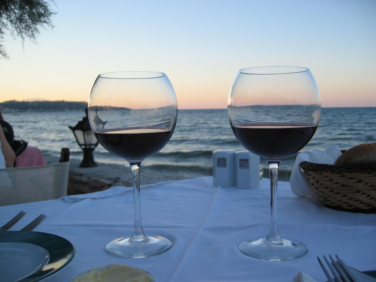 Close-up of wine glasses on table