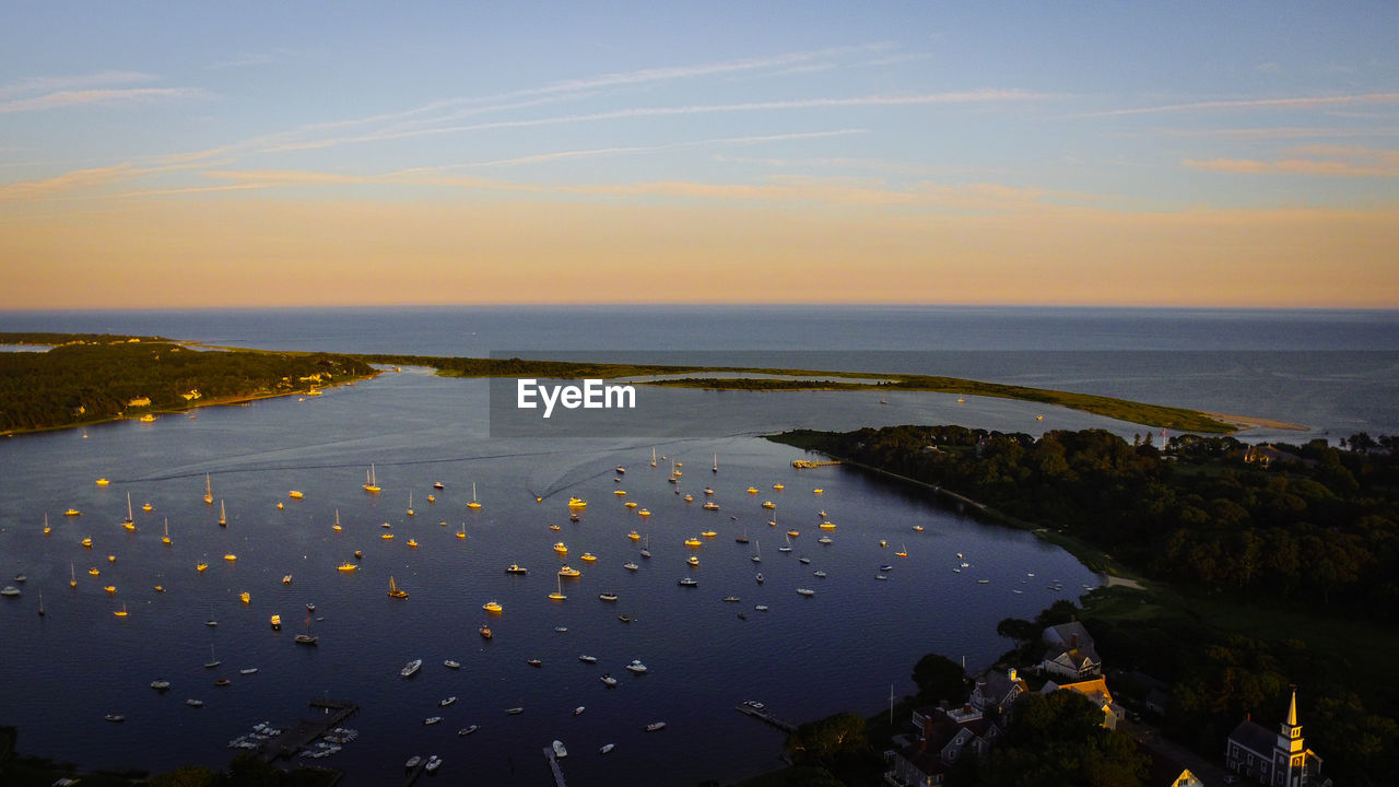 Scenic view of sea against sky at sunset