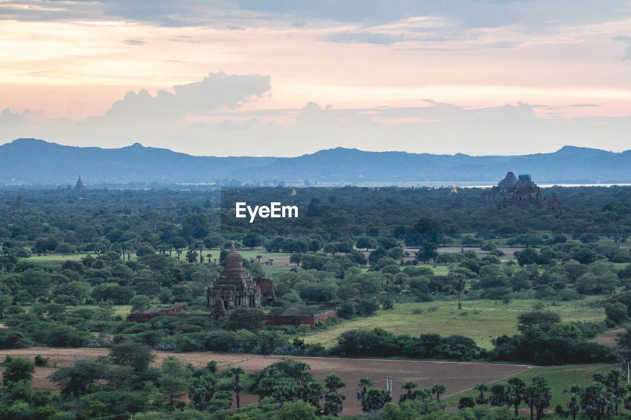 Scenic view of landscape against sky during sunset